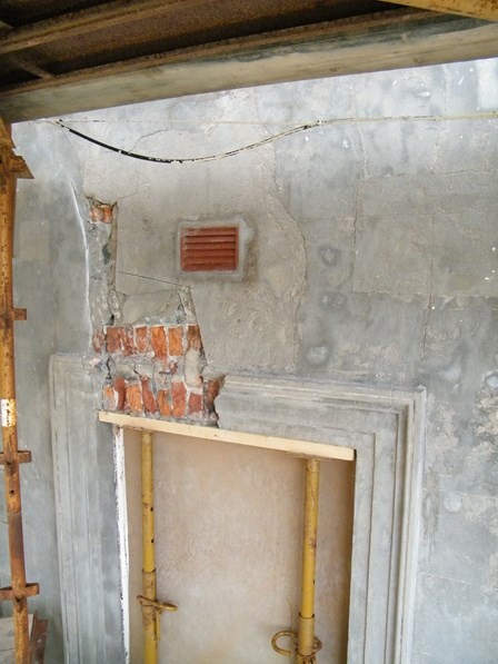 The building was opened up, and it was revealed that there was no existing lintel; the window head being made up of soldier bricks, at Cushendun, Co. Antrim, NI