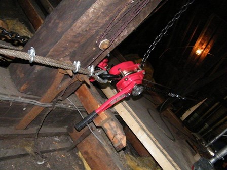 The trusses had been affected by wet rot, and moved out of place; and had to be lifted and jacked back into place, at Falkirk, Stirlingshire, Scotland