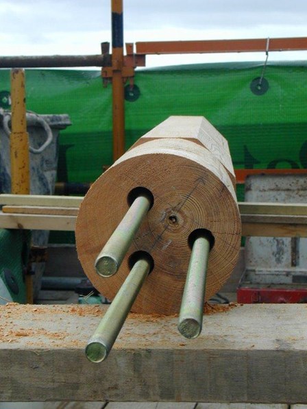 The metal rods are inserted, splicing the existing and new timbers together, at the Braid Centre, Ballymena, Co. Antrim, Northern Ireland