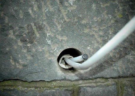 Cintec anchor installed to repair structural cracks; photo shows anchor installed, prior to resin being injected, at Mount Stewart House, Newtownards, Co. Down, N. Ireland