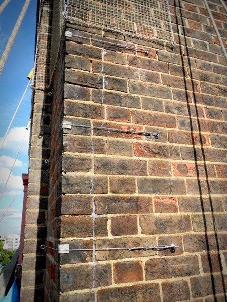 Stainless steel masonry consolidation netting was fixed to the facades to prevent falling masonry, at Claridges Hotel, London