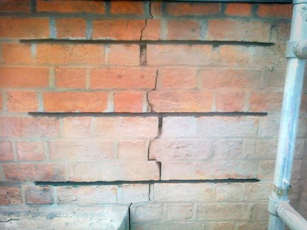 Cracks in the masonry: crack stitching method to repair the structural cracks, at Queens University, Belfast, Co. Antrim, NI