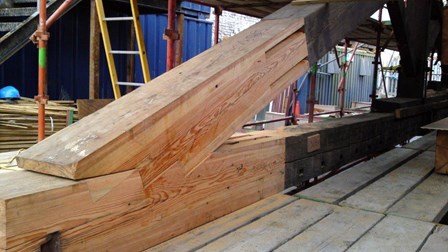 The finished spliced timber truss; showing the reclaimed pitch pine portion along with the existing timber truss at First Derry Presbyterian Church, Londonderry, Northern Ireland