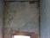Cracks in the masonry walls above windows, due to a failed lintel, at Belfast, Co. Antrim, Northern Ireland