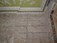 Vertical cracks in brick wall, with helical crack stitching bars evident, O'Connell St, Dublin, Ireland