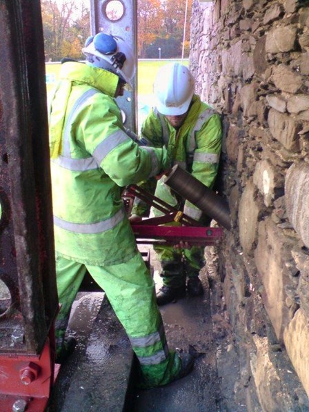 The wall is diamond drilled, prior to installing the Cintec anchor, Bangor, Co. Down, NI.  