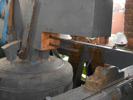 The wet rot was removed, and reinforcing bars were inserted to repair the structural timber & bond the new timbers to the existing at The Guildhall, Derry, NI