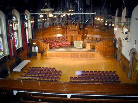 The existing main council chamber, within which, Stronghold Preservation carried out remedial timber repairs for wet rot, dry rot and woodworm, at The Guildhall, Londonderry, Northern Ireland