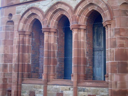 Bird wire in openings to bird proof against nuisance pigeons at The Guildhall, Derry, NI